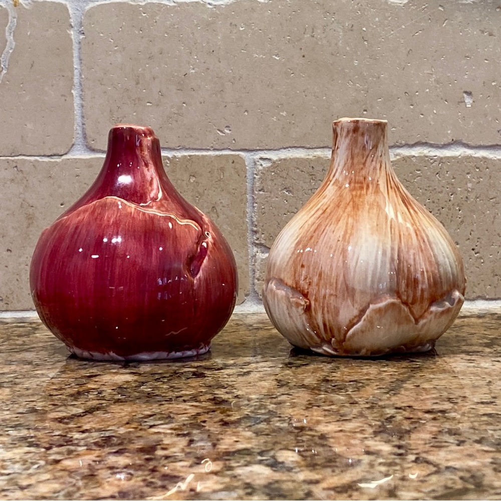 Dept. 56 salt and pepper shakers.  Red onion and yellow onion (or garlic). EVC